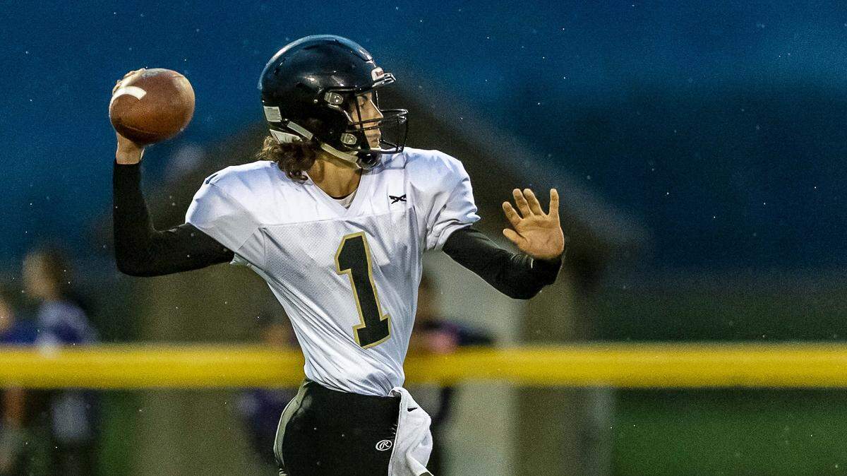 Meridian quarterback Dawson Logan delivers a pass against Nooksack Valley Sept. 21. Logan made the switch from receiver last year and has been an integral part of the Trojans’ offense as they prepare to play Mount Baker in an NWC 1A showdown Friday.