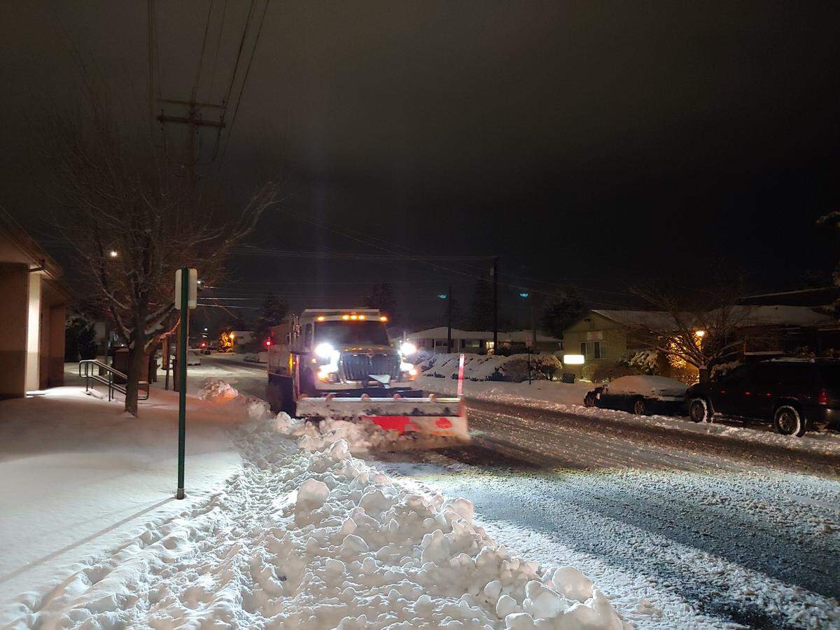 Public Works crew members plow snow from Bellingham during the 2021 Valentine’s weekend storm.