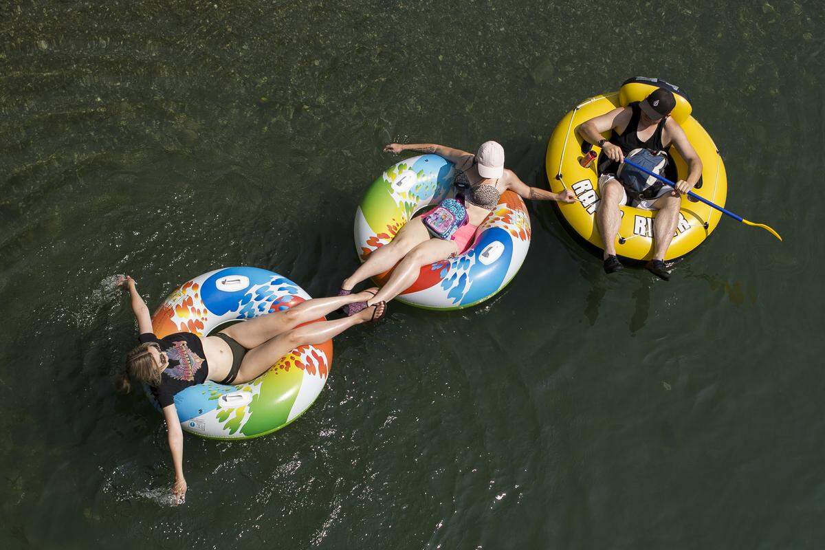 People float on tubes in the south fork of the Nooksack River in Acme in 2018.