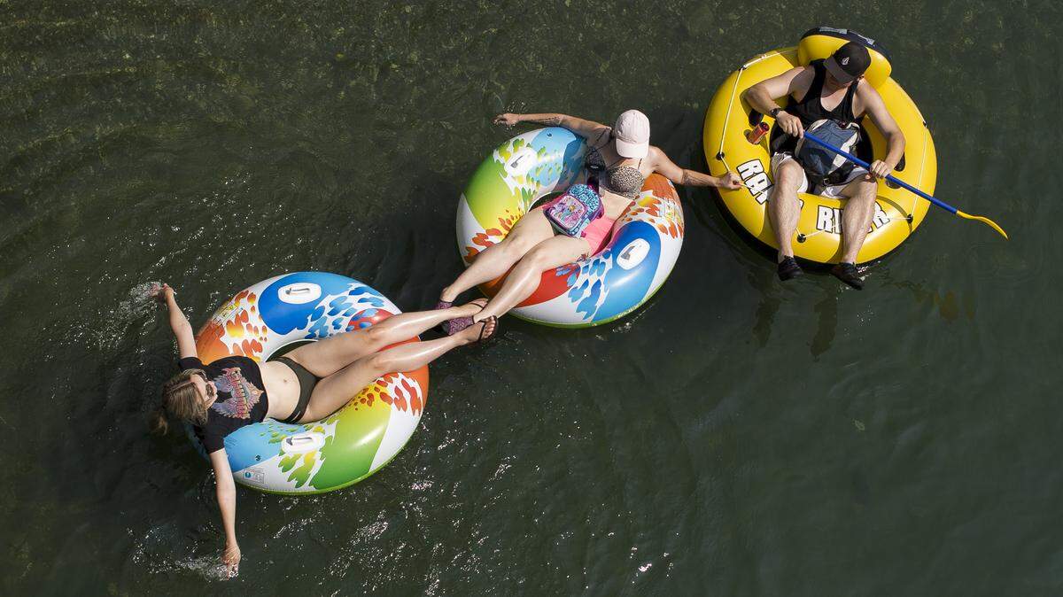 Siblings Angela Bower, Alleana Bower and Alex Bower float on the south fork of the Nooksack River near Acme in this file photo.