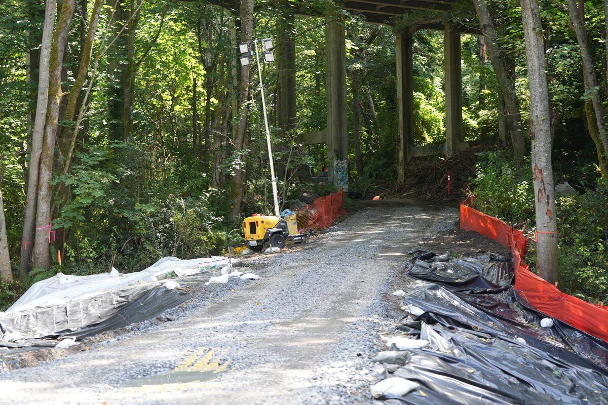 Fish passage and diesel spill mitigation work was underway along the Interurban Trail under the 12th Street bridge on Aug. 18.