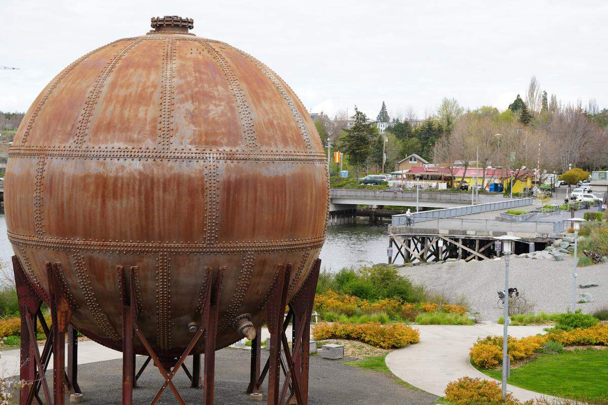 Bellingham’s iconic acid ball stands at Waypoint Park on April 11, 2025, in Bellingham, Wash. The 438,000-pound orb was originally part of the cooking equipment used to turn raw wood chips into pulp on Bellingham’s downtown waterfront.