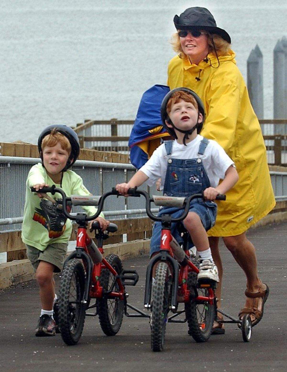 Lynn Ostrovsky pushes her son Sam up Taylor Avenue Dock as his twin brother Jack follows on Aug. 28, 2004, in Bellingham. The boys grew up in Bellingham’s South Hill neighborhood before Jack went on to join the U.S. Marines.