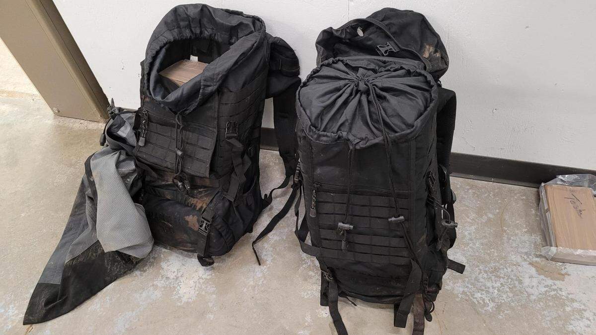 Backpacks containing 78 pounds of cocaine with an estimated value of $1.1 million were found in the woods north of Lynden, Wash., on Thursday, Dec. 19.