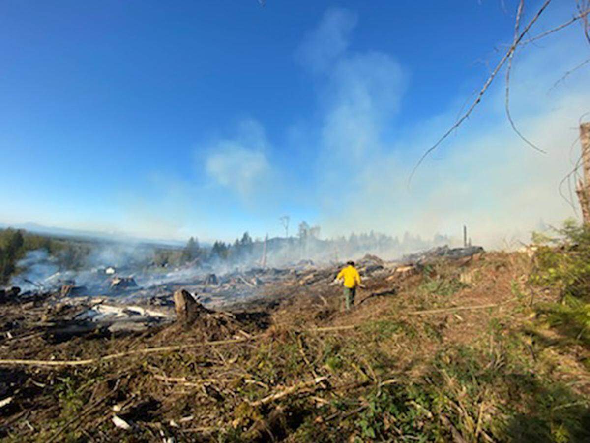 Fire crews battle the Kelly Road Fire northeast of Bellingham, which has burned 10 acres near the Mount Baker Highway since Sunday afternoon, April 18. No injuries or structure damage is reported.