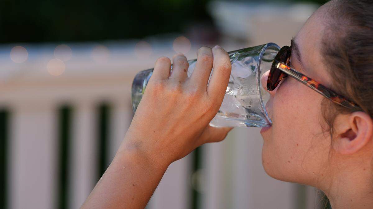 A Bellingham resident drinks ice water during a heat wave on July 5, 2024.