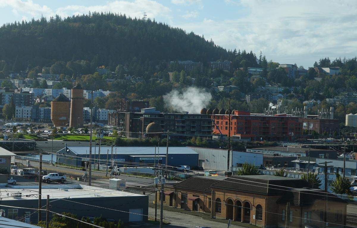 Two of the three luxury condos planned along Bellingham’s waterfront are seen under construction from the nearby Old Town Neighborhood on September 27, 2024, in Bellingham, Wash.