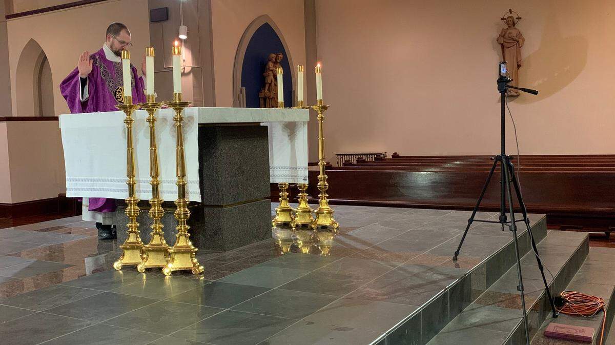 Rev. Jeffrey Moore, priest at Assumption Catholic Church in Bellingham, has been streaming Mass and prayer online since the COVID-19 outbreak and Gov. Jay Inslee’s stay-at-home order has barred people from gathering, including for spiritual reasons.