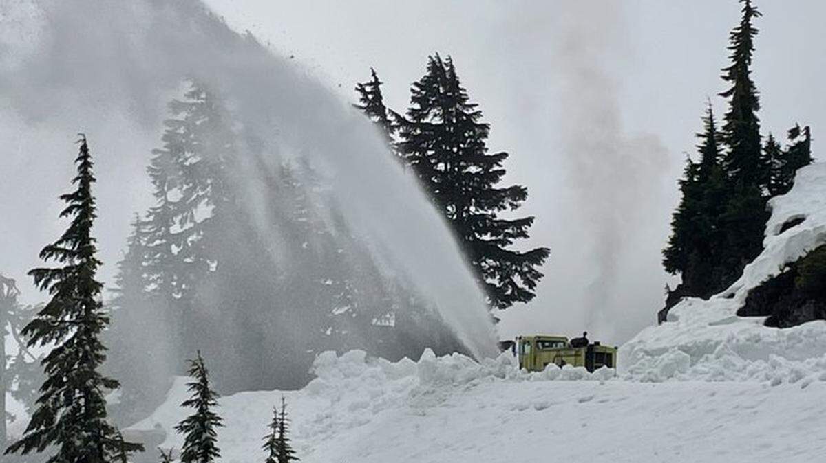 A Washington State Department of Transportation snow-blower works to clear the Mount Baker Highway from the Mt. Baker Ski area to Artist Point in a photo taken in late May.