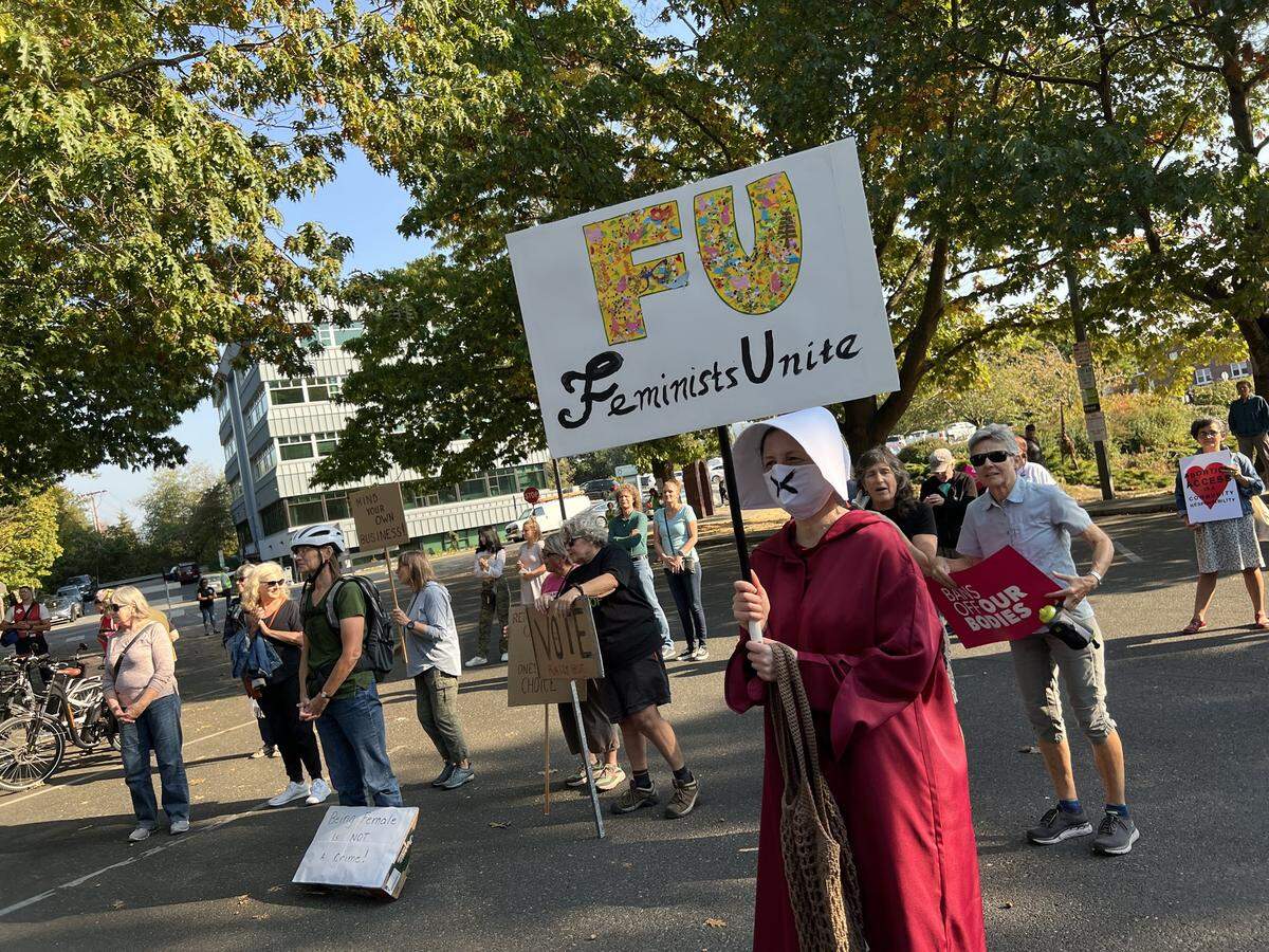 About 500 people joined at an event held by Indivisible Bellingham Saturday, Oct. 8, in front of City Hall that coincided with Women’s March for reproductive rights rallies across the nation.