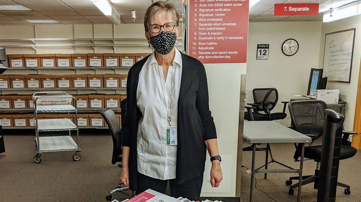 Whatcom County Auditor Diana Bradrick with ballots after the Aug. 4, 2020, primary election. In a Whatcom County Government Facebook post, she said “Every election hundreds of ballots go uncounted because voters don’t know to check the pick-up times where they drop off their mail.. It’s really sad because these are votes we’re unable to count. It also represents a cost to taxpayers because these ballots require special handling.”