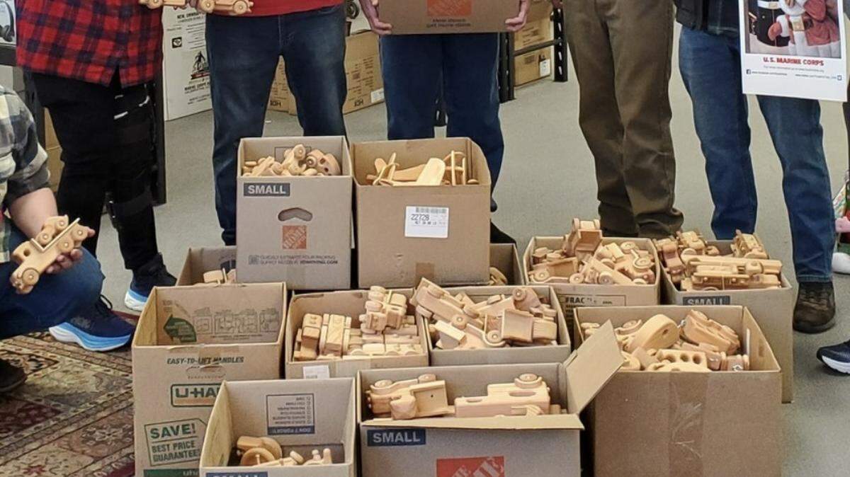 Every year, a local Whatcom County resident handcrafts and distributes 500 wooden toys for kids in need through the local Toys for Tots drive. In 2023, Whatcom County’s ‘Secret Santa’ built logging trucks with trailers and trucks with trailers.