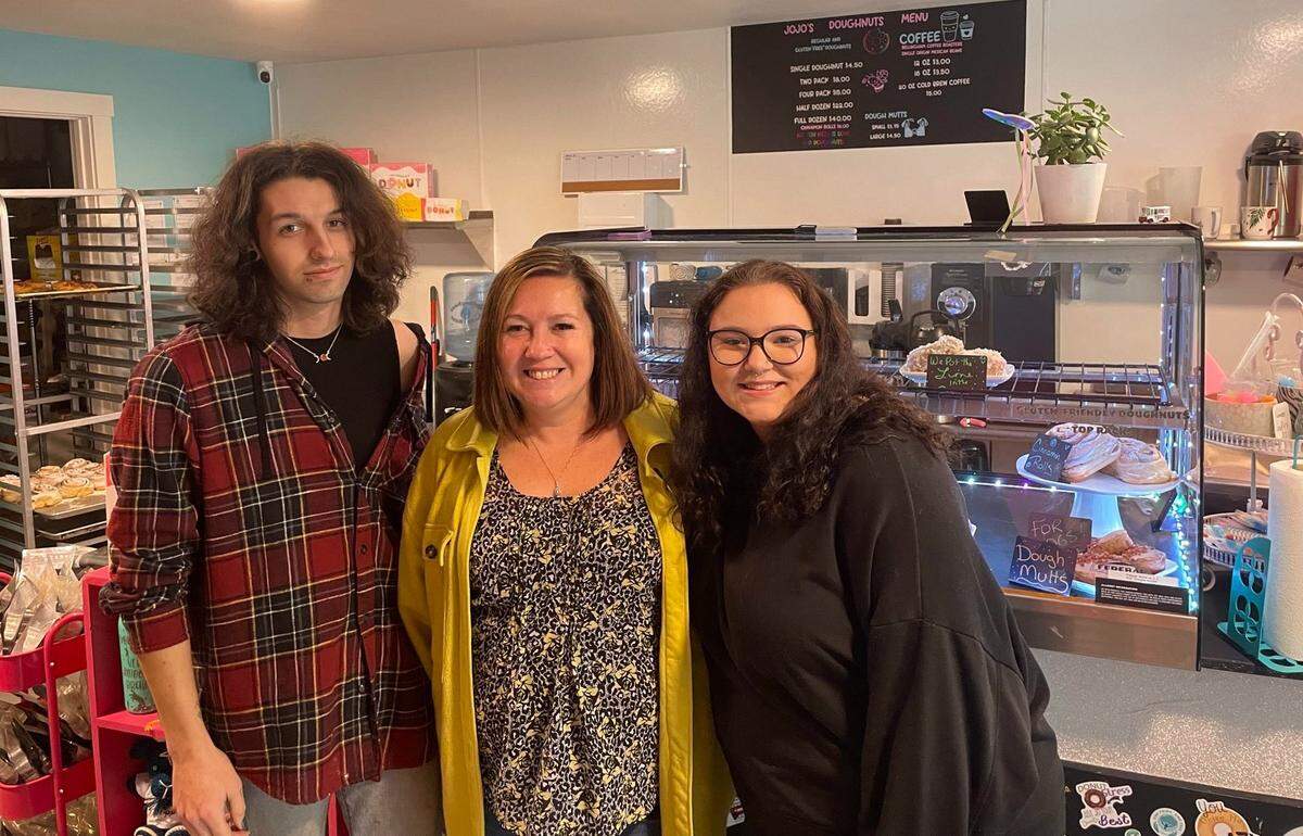 “Doughnut slinger” Morgan Dutton, left, owner JoAnne Dutton and “Diva Donut Designer” Bella Claflin on duty Wednesday, Jan. 25, at Jo Joe Doughnuts in Bellingham.