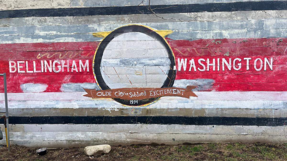 Stephen Stimson’s mural at 109 Prospect Street coined Bellingham’s unofficial nickname, “The City of Subdued Excitement.”