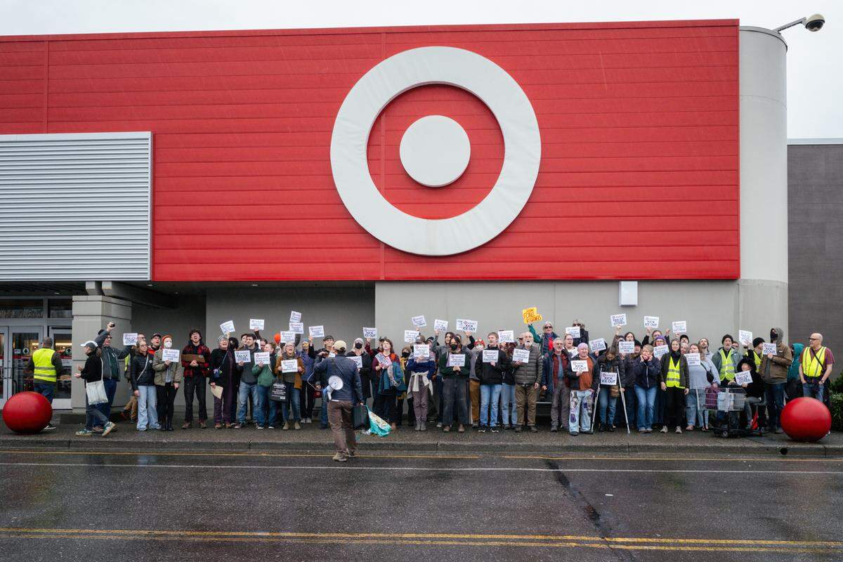 More than 50 community members gathered at Target on Saturday in Bellingham as part of a national call to protest the corporation’s “cooperation” with U.S. Immigration and Customs Enforcement (ICE).