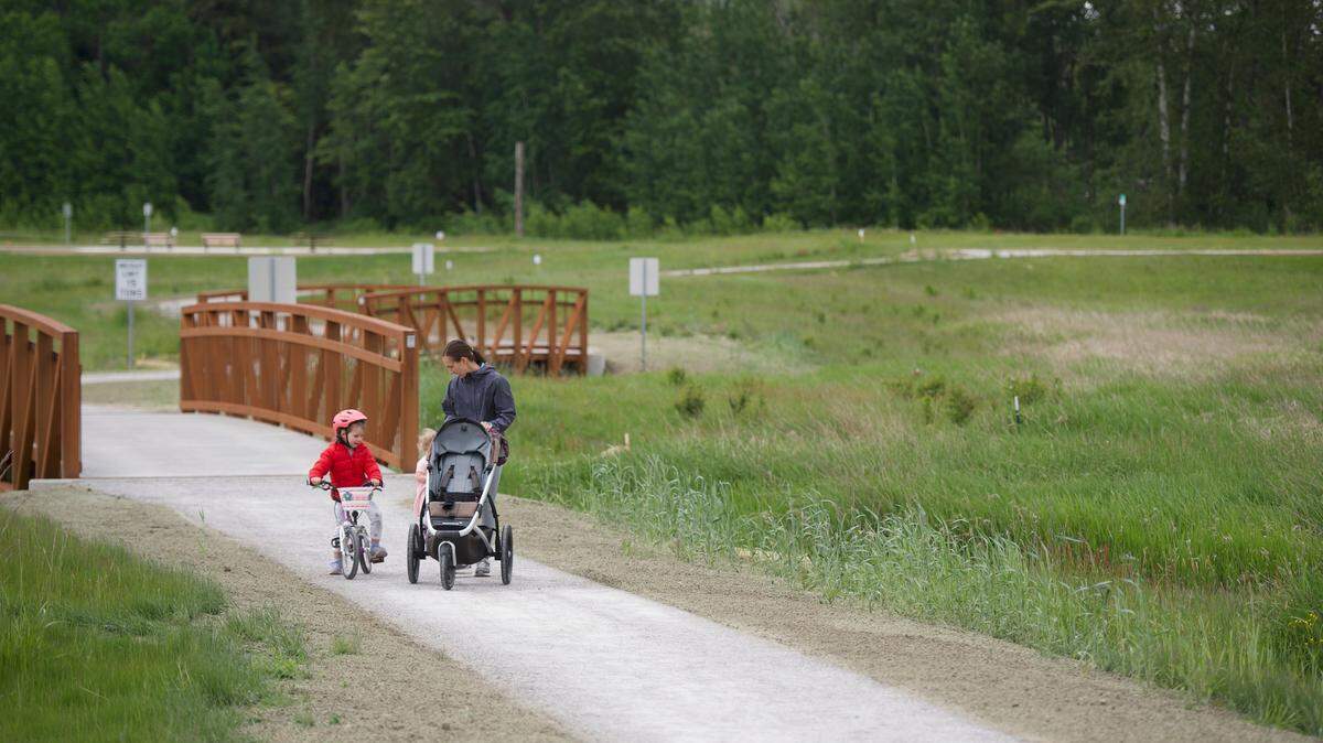 Park-goers walk through three-quarters of a mile of trails in Cordata Park that opened to the public in 2020 in north Bellingham. Bellingham is buying a tract of land west of Meridian Street, a mostly wetland area that will add to Cordata Park and provide easier pedestrian and bicycle access to Meridian Street.