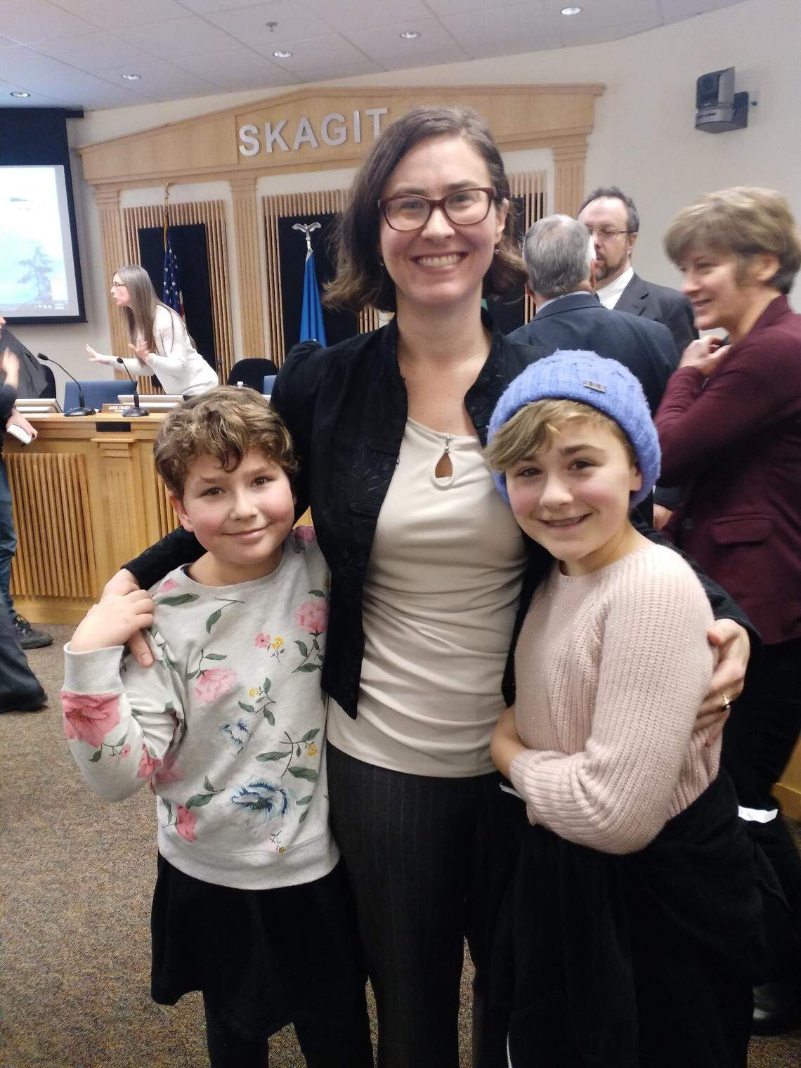 State Sen. Liz Lovelett, with her children in the Skagit County Council chambers in Mount Vernon after the vote Tuesday, is Washington’s newest legislator. She replaces Kevin Ranker, who resigned just as the current legislative session was set to start in January.