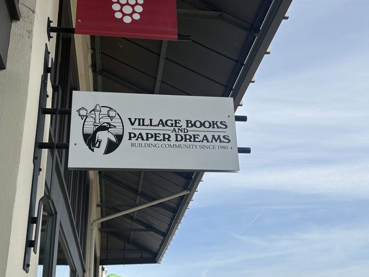 The sign outside Village Books and Paper Dreams in Lynden.