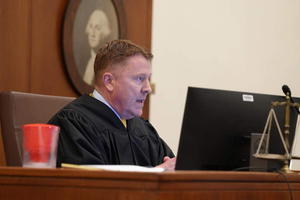 Whatcom County Superior Court Judge Robert Olson recused himself from a case in a crowded courtroom on Friday, August 30, 2024, in Bellingham, Wash. The case challenges an initiative that seeks to repeal a tax that funds local child-care programs.