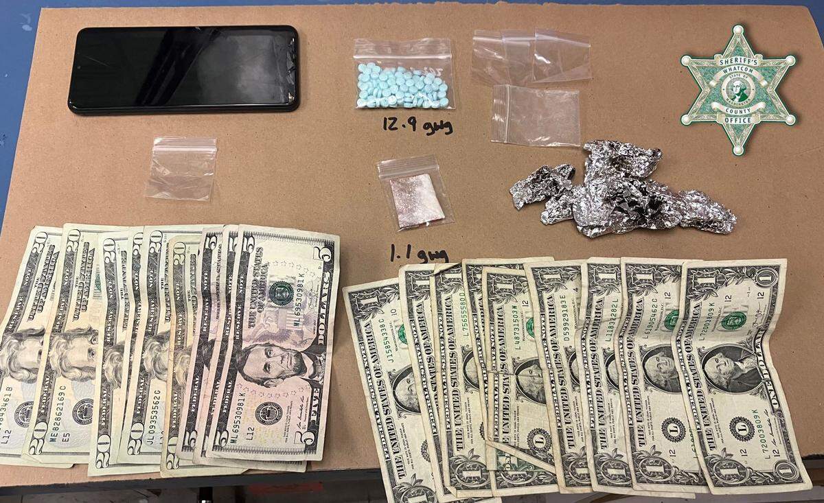 The Whatcom County Sheriff’s Office displayed some of the items recovered from a search Tanner Allen Larson, 30, who was arrested Wednesday, Aug. 3, on suspicion of one count of controlled substance homicide for the death of a Blaine woman in 2021. Found in the search were a zip lock bag with an unidentified powder, four empty zip lock bags, burnt foil with narcotic residue and a bag with about 100 blue M-30 pills that weighed 12.9 gross weight grams (fentanyl).