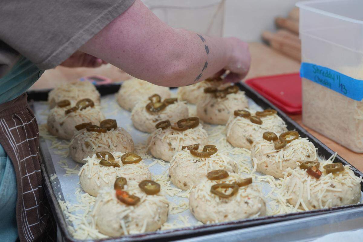 Clara Dwyer prepares to bake jalapeño cheddar bagels.