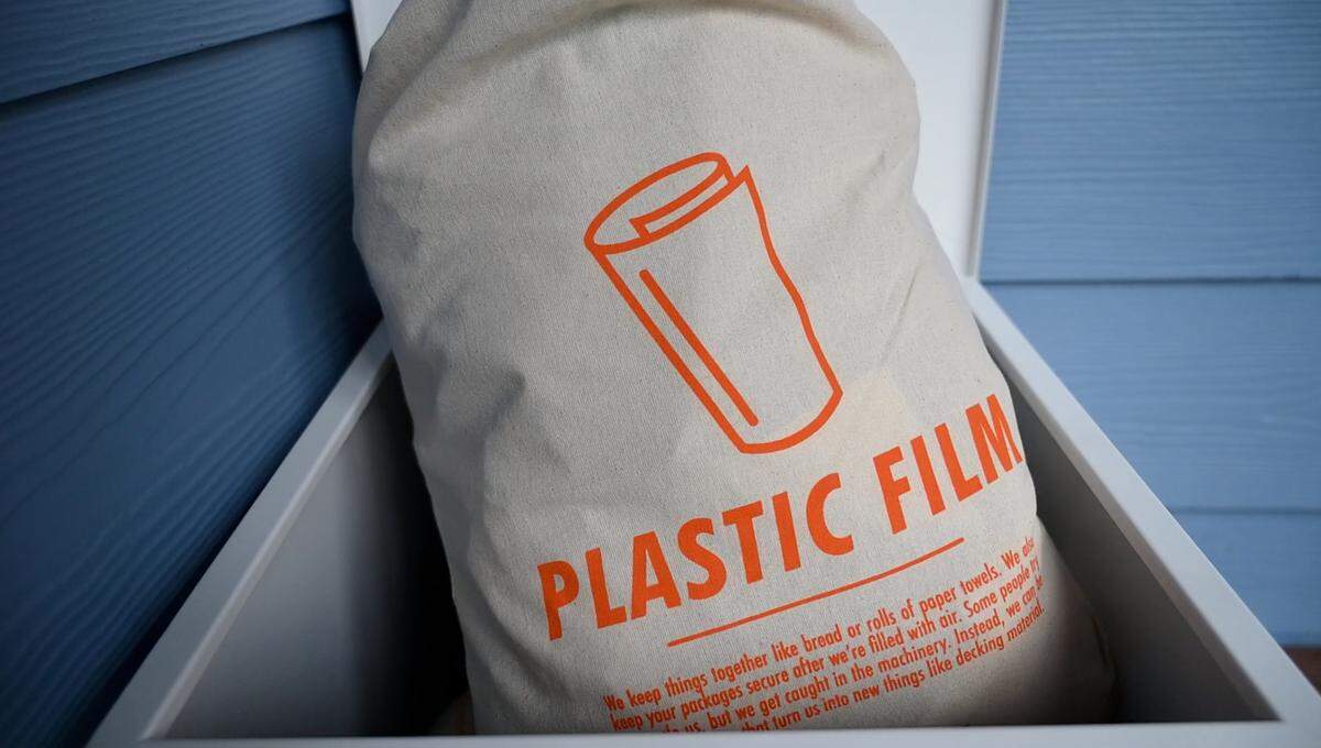 A bag placed outside of a Ridwell member’s home is filled with plastic film on Thursday, June 10, in Bellingham.