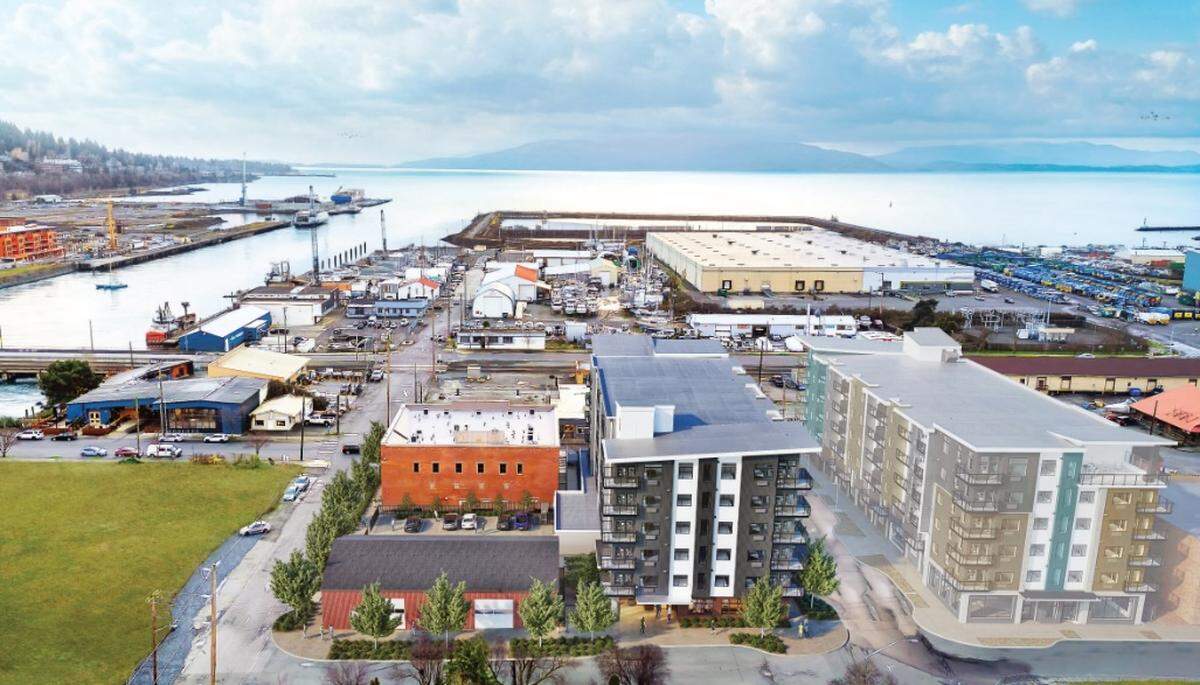 An artist’s rendering shows new developments planned for the Old Town District in Bellingham. Construction began on the white and gray building in the middle in March. It will be the first of several developments planned for eight city blocks within the district.