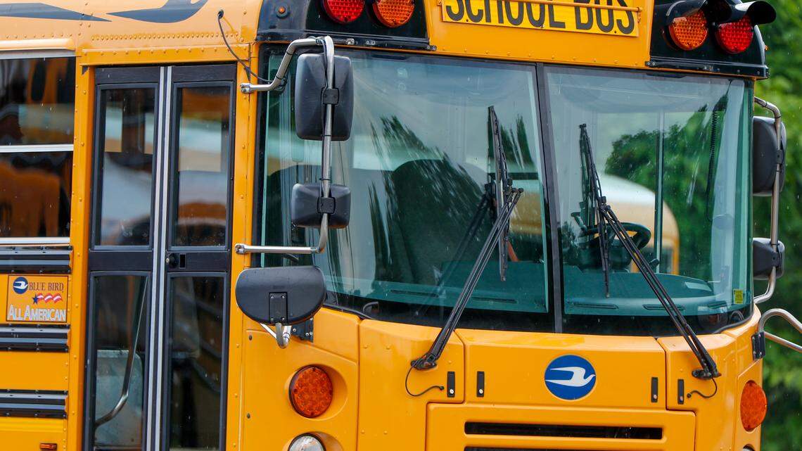 A student was hit while crossing at a bus stop, Kansas officials said.
