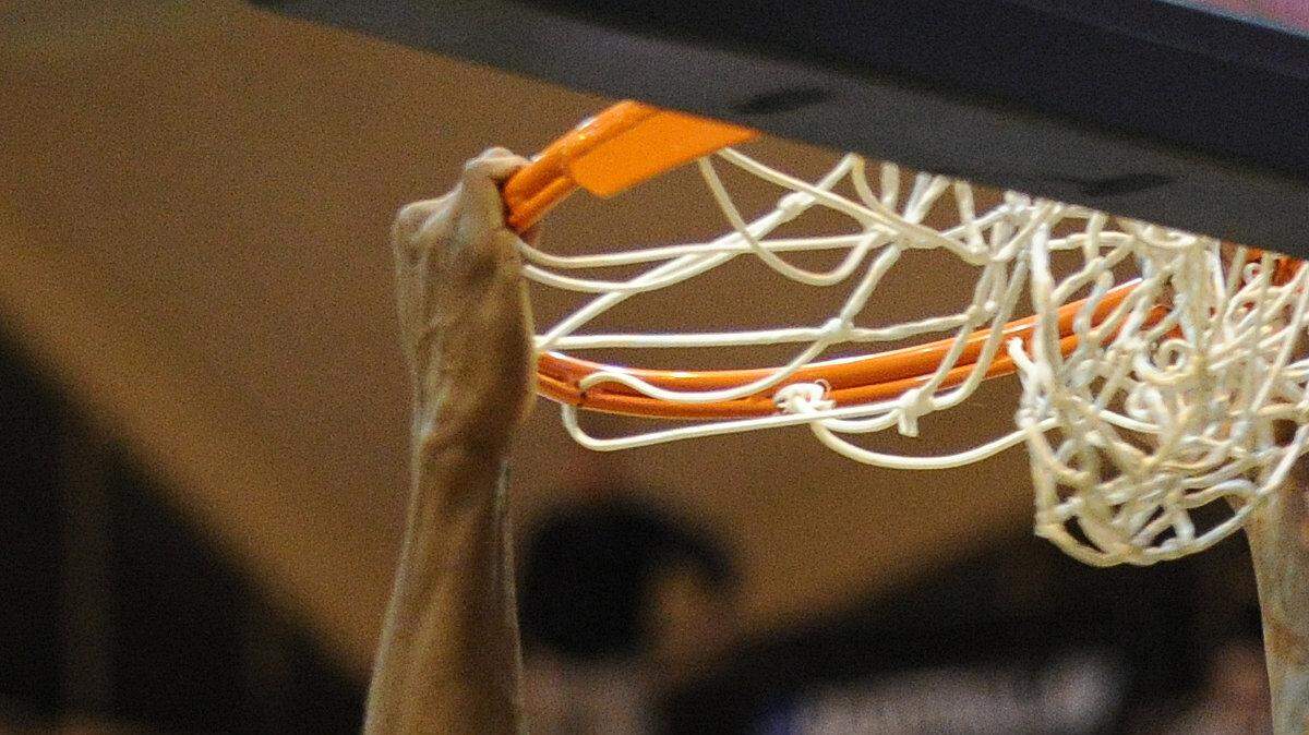 Western Washington University's Anye Turner slam dunks the ball as WWU loss to Seattle Pacific University 76-60 Wednesday, Jan. 15, 2014, at Carver Gymnasium.
