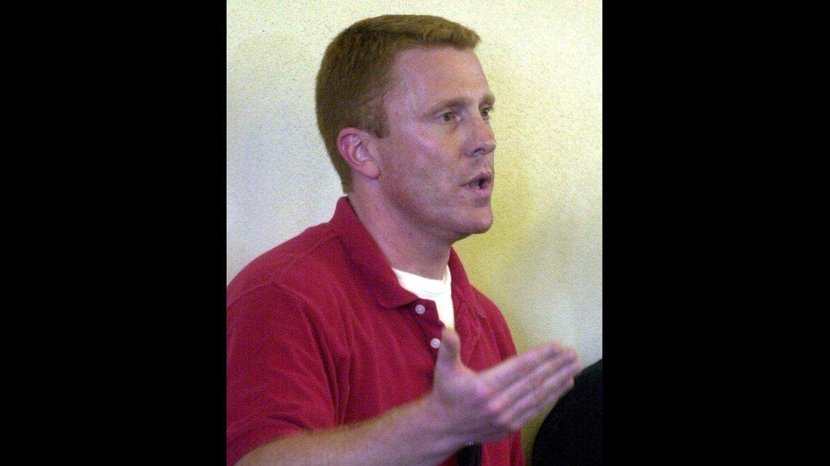 Rob Olson asks Bellingham asks a question during a public meeting in 2003. Washington Gov. Jay Inslee announced Wednesday, Aug. 8, that he has appointed Rob Olson to Whatcom County Superior Court, replacing the late Judge Ira Uhrig. His appointment is effective immediately.