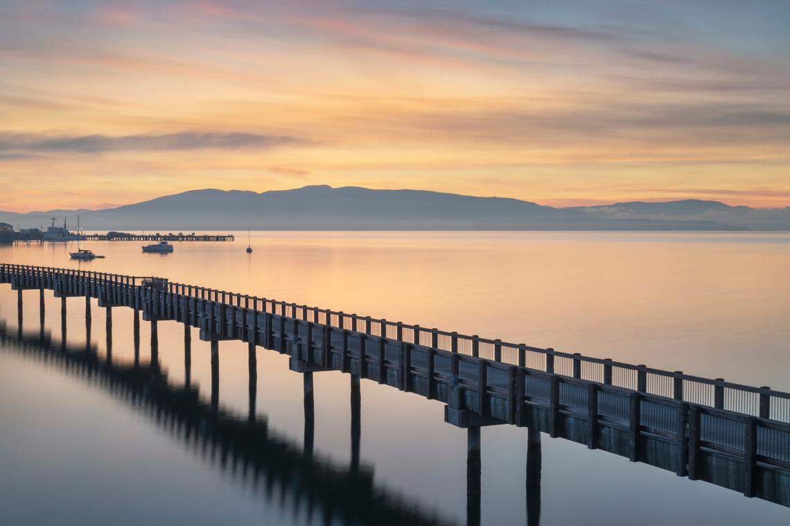 Taylor Dock Boardwalk during twilight afterglow at Boulevard Park in Bellingham, Wash.