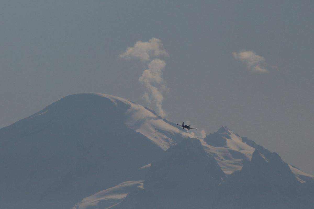 Mark Swenson of Bellingham shot this photo of a small plane taking in the view on Saturday as Mount Baker’s steam plume rises impressively because of a clear day with relatively light winds. Swenson was on Ferndale Road south of Slater Road.