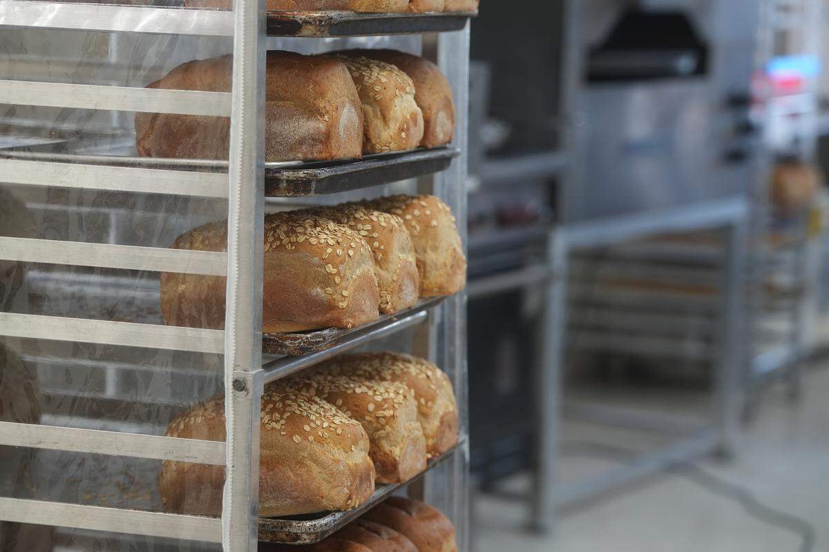 Loaves of bread are freshly baked at Millet Bakery.
