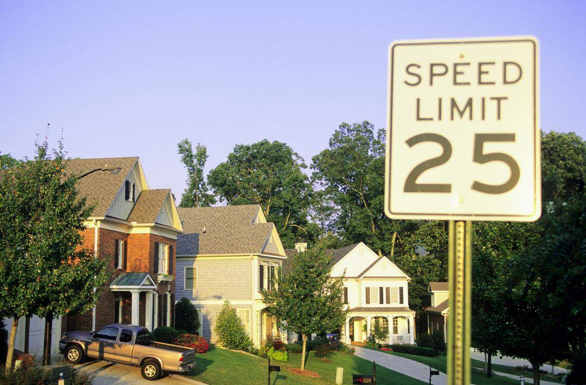 Residential neighborhood speed limit sign.
