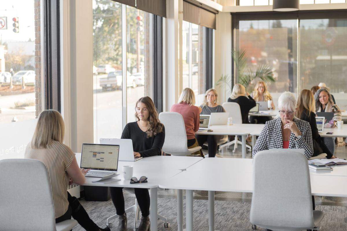 Women work at Her Connection Hub, a co-working space for women that recently opened in downtown Bellingham with 6,000-square-feet of space offering a variety of workstations and conference rooms.