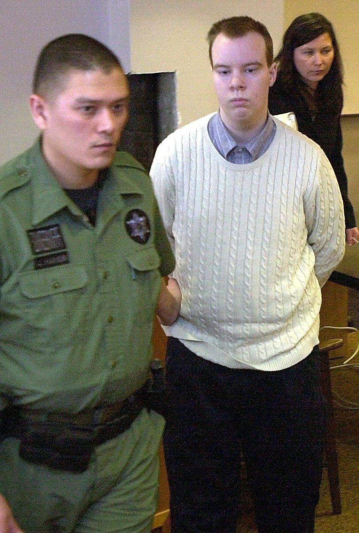 Ryan Alexander, center, is escorted out of Whatcom County Superior Court Judge Steven Mura's courtroom in 2004 after being found guilt of aggravated first-degree murder and first-degree kidnapping of his 8-year-old neighbor, "Mikey" Busby Jr. on April 18, 2002.