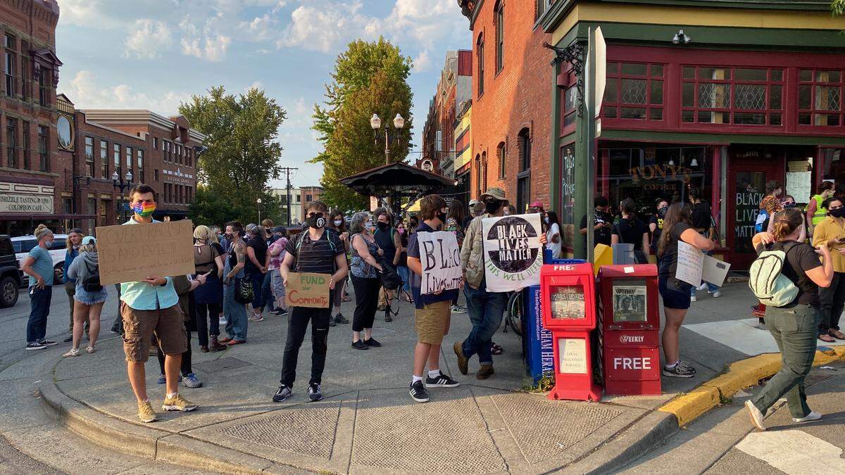 Bellingham protesters gather in Fairhaven before marching to Bellingham Mayor Seth Fleetwood’s South Hill home to voice their concerns and ask for the Bellingham Police Department to be defunded Friday.