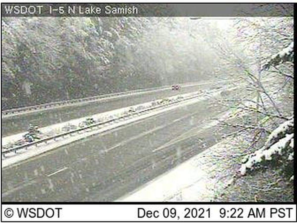 Snow falls, but isn’t sticking on the roadway, at the Interstate 5 at Lake Samish according to an image from the Washington State Department of Transportation camera Thursday morning, Dec. 9, south of Bellingham.