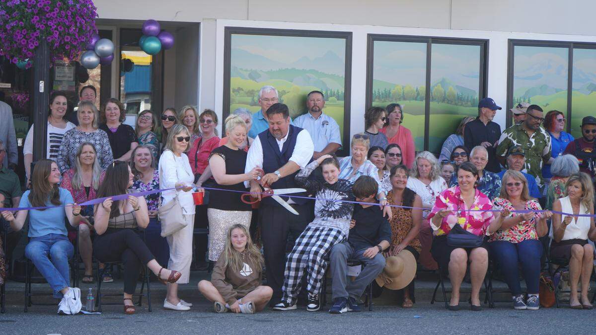 More than 50 people gathered for the ribbon cutting in front of the new Youth Crisis Triage Intensive Outpatient Center on Aug. 17, 2023, on Main Street in Everson, Wash.