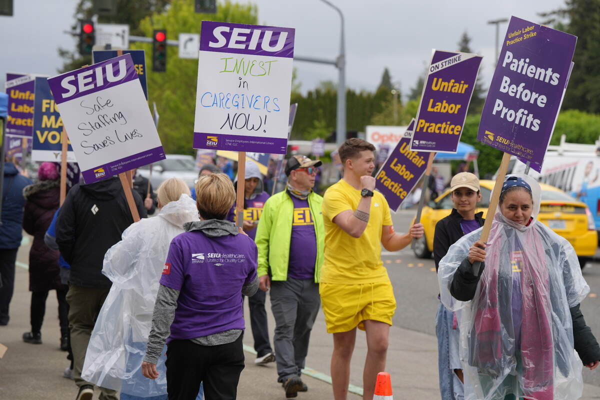 PeaceHealth employees represented by the Employees International Union (SEIU) 1199NW and the Union of American Physicians and Dentists (UAPD) demonstrated outside of the Bellingham hospital on Thursday.