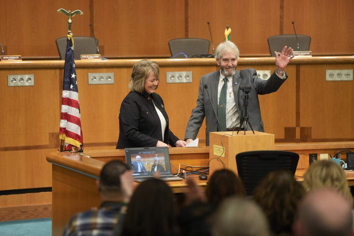 Whatcom County Council member Barry Buchanan (right) participates in the oath of office ceremony on Jan. 12.
