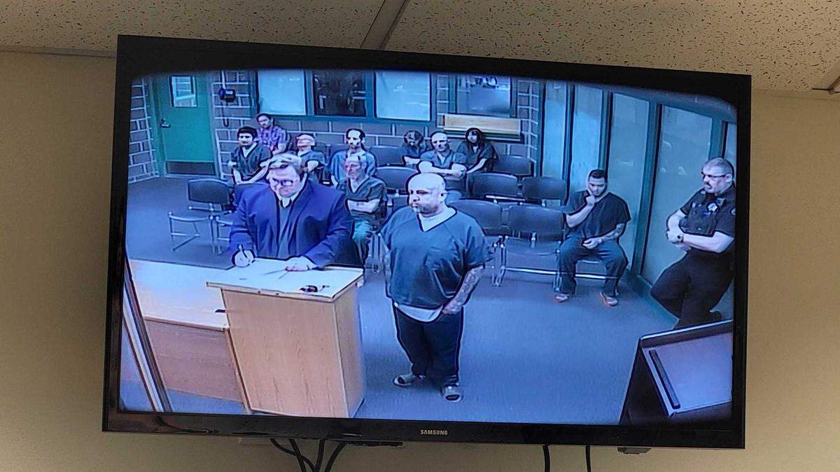 Angel Lewis Leffingwell, 38, of Everett (right), stands with his public defense attorney, Matthew Palmer (left), as he makes his first appearance in Whatcom County Superior Court Monday, March 18, 2024 in Bellingham, Wash. Leffingwell is accused of providing drugs to two other prisoners incarcerated in the Whatcom County Jail, resulting in one man’s death and another being hospitalized.