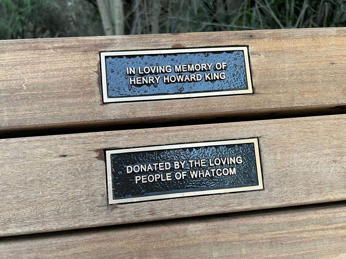 A memorial bench for Henry King is installed at Boulevard Park in Bellingham, Wash. King was a formerly unhoused and well-loved community member who was shot to death on the boardwalk between Boulevard Park and Taylor Dock on March 12, 2023.
