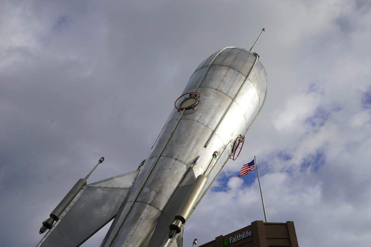 The iconic rocket art installation returned to its spot on the corner of West Holly and Bay streets Thursday, Oct. 27, in Bellingham. It was removed for maintenance for almost a year.
