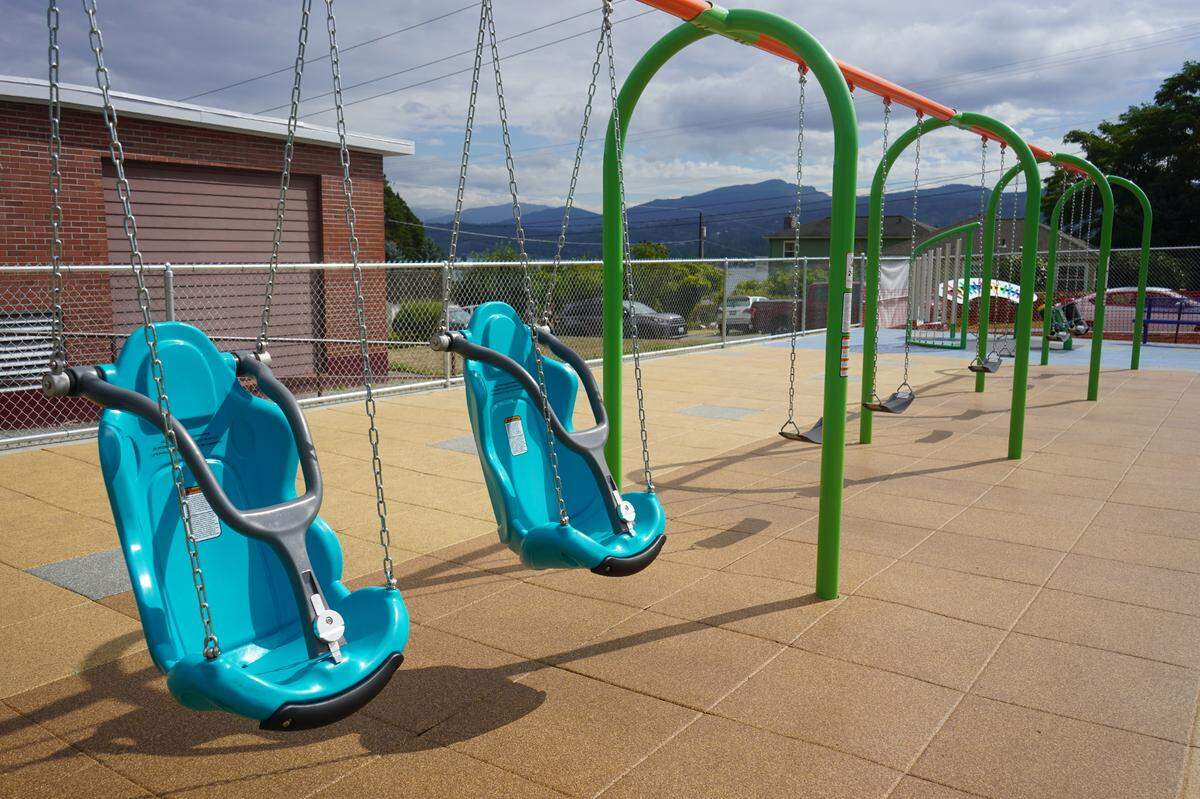 Some of the swings at the inclusive playground at Silver Beach Elementary School have supportive backs and secure straps so that differently-able children are able to use them. The new playground was completed on Aug. 28. 2023, in Bellingham, Wash.