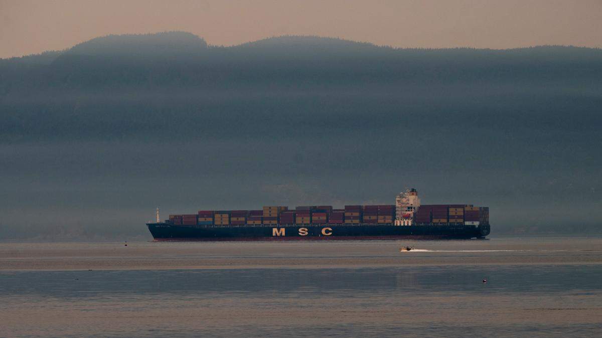 The 965-foot MSC POH LIN container ship waits in Bellingham Bay on Friday, Aug. 13. It’s one of many large ships at anchor in Bellingham Bay this summer, waiting to go into busy ports such as Seattle and Tacoma.