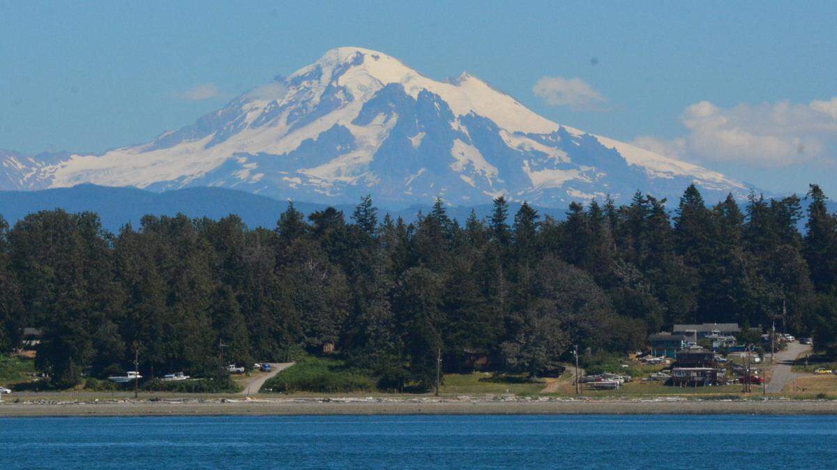 A view of Gooseberry Point from Lummi Island, with Mount Baker in the background.