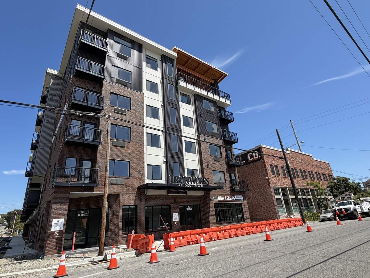 Street improvements were underway in front of the new Ironworks at Old Town housing development on Astor and Holly streets on July 7.