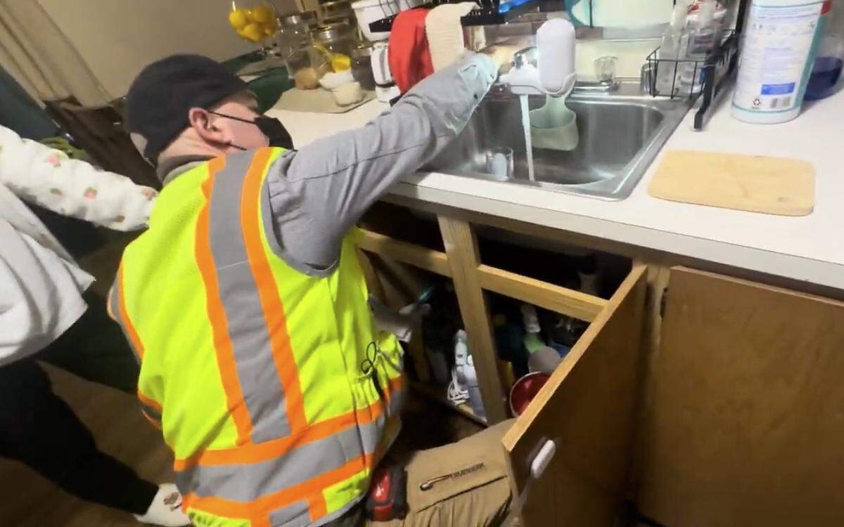 A city of Bellingham residential rental inspector conducts an inspection of Maria Alexander’s apartment in early 2026. The inspector, who is not associated with the complaint made by tenant advocates, was enforcing the Rental Property Safety Inspection Checklist.