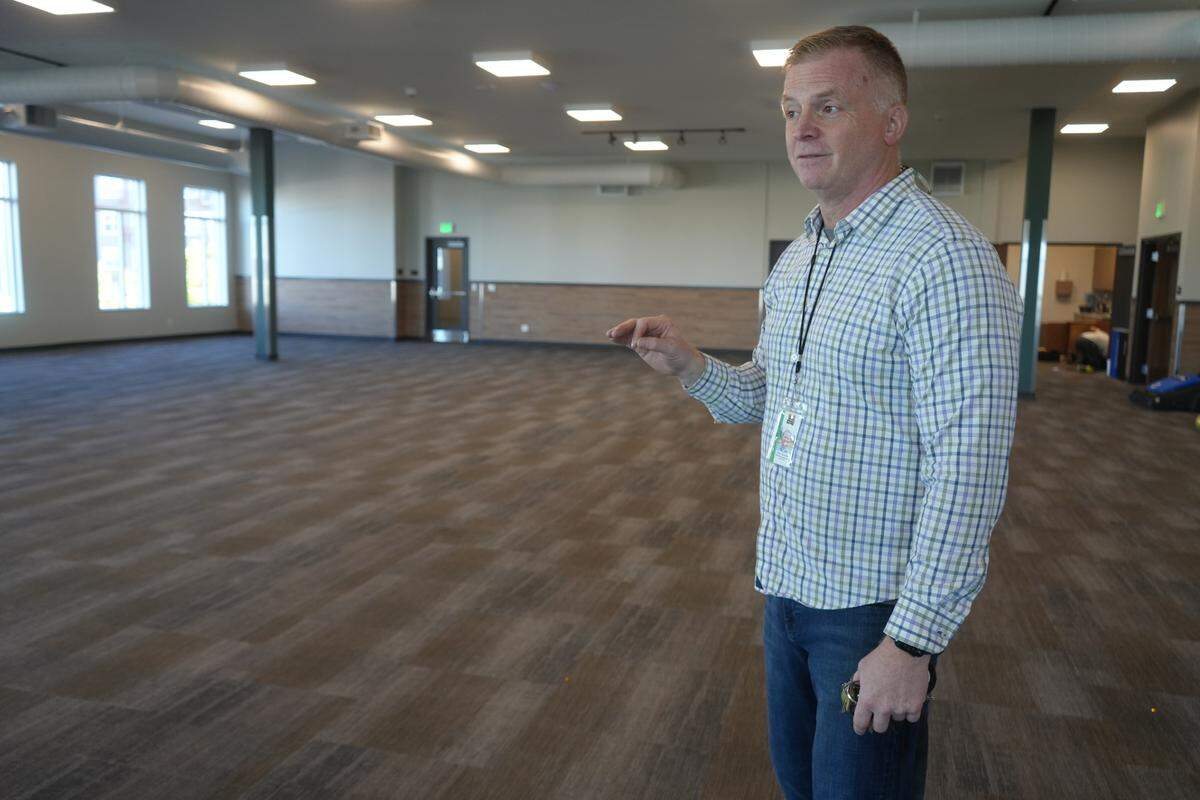 Former Lighthouse Mission Ministries Chief of Advancement Loran Zenonian stands inside the chapel space in the organization’s newly built homeless shelter and services building at 1312 F Street on Sept. 27, 2024, in Bellingham.